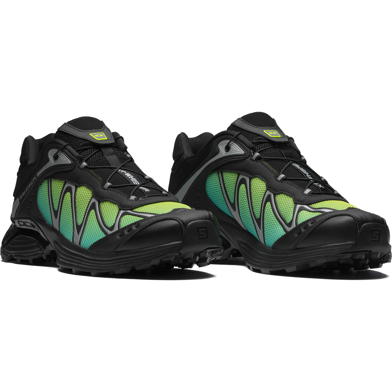 Salomon XT-Whisper sneaker with a textured, layered design, wavy Sensifit™ technology, Quicklace system, and a premium material upper for enhanced fit and style.