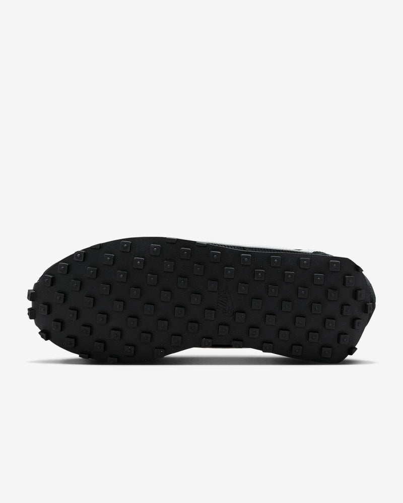 Nike LD-1000 sneaker with flared heel design, classic 1977 running silhouette reimagined for modern streetwear