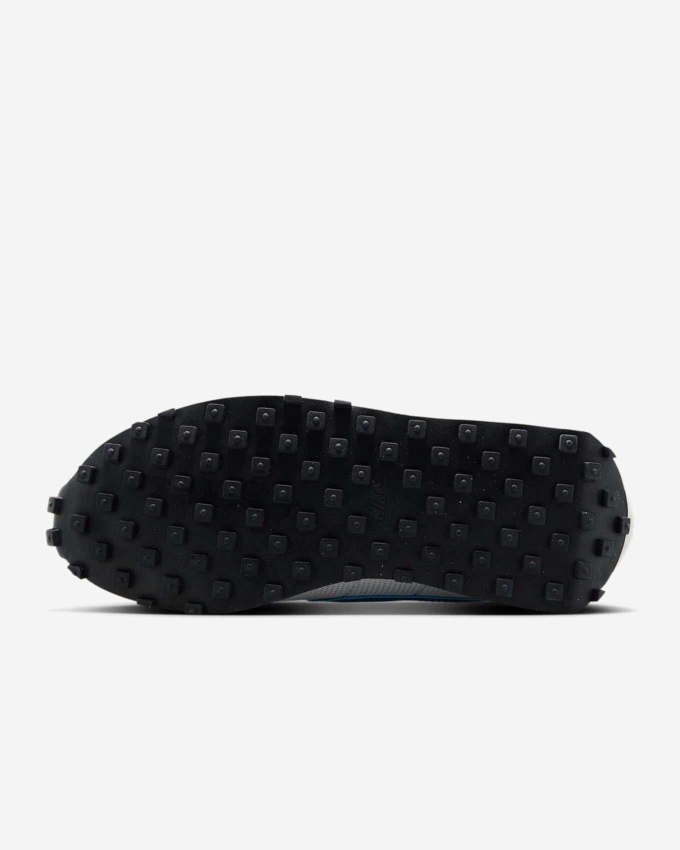 Nike LD-1000 sneaker with flared heel design, classic 1977 running silhouette reimagined for modern streetwear