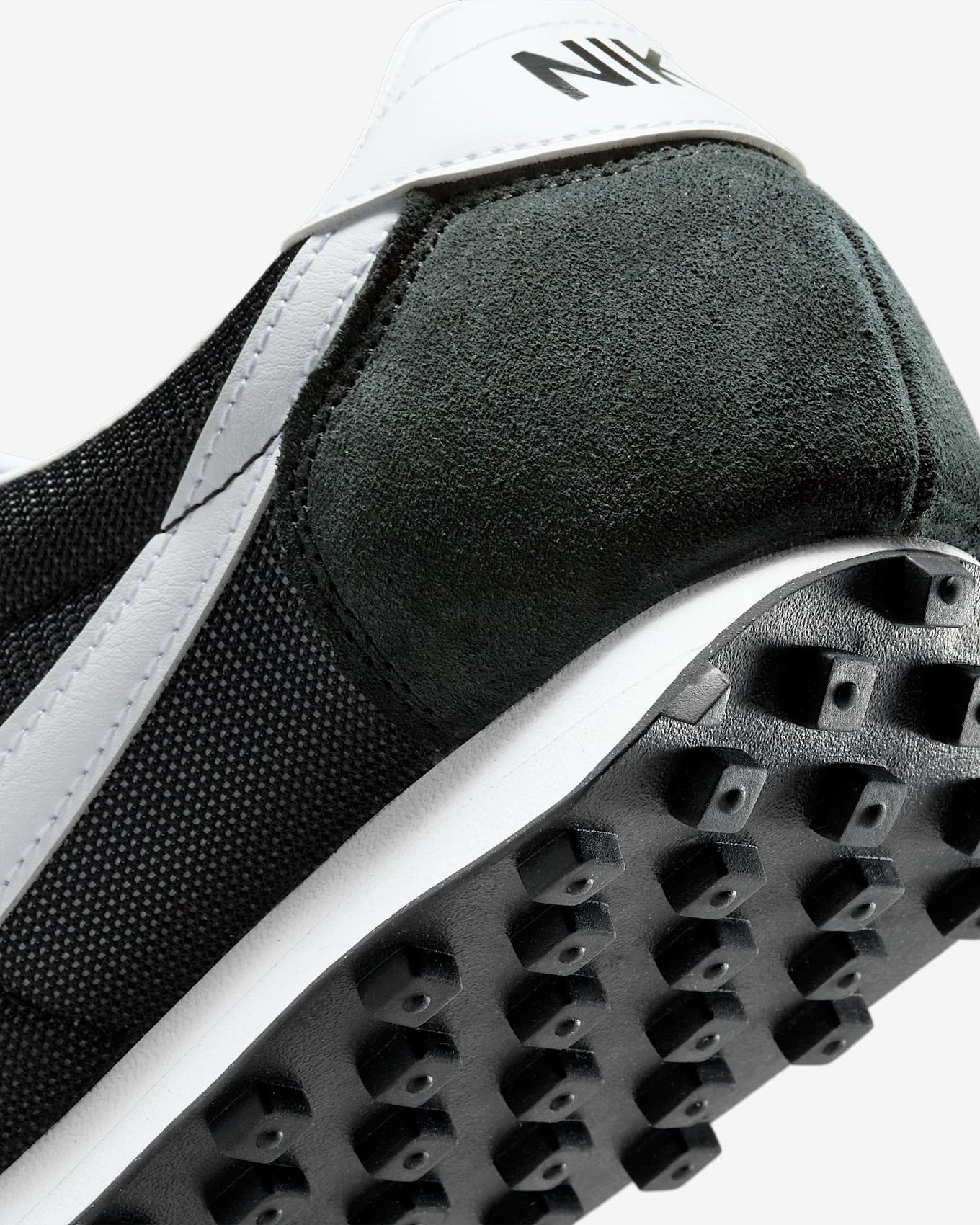 Nike LD-1000 sneaker with flared heel design, classic 1977 running silhouette reimagined for modern streetwear