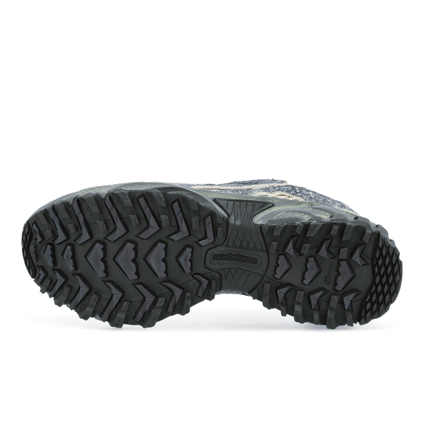 New Balance trainers with Gore-Tex waterproofing, C-CAP cushioning, and rugged outsole, combining retro trail running design with modern technology.