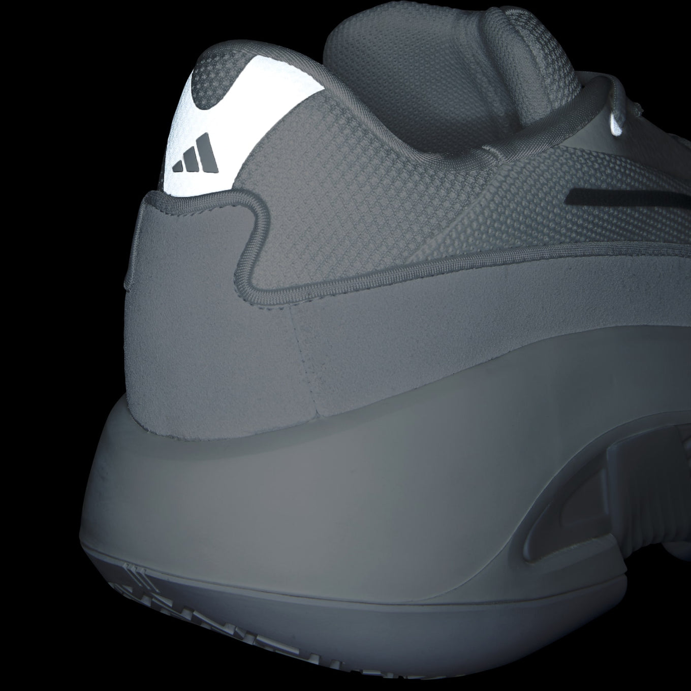 adidas shoes inspired by 2000s basketball, featuring a mixed-material upper and TPU shank for comfort and style.