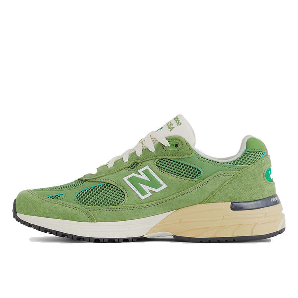 New Balance 993 from the MADE in USA Seasonal Collection, featuring a mesh upper overlaid with premium nubuck in 'chive' green, atop a dual-color white and off-white midsole.