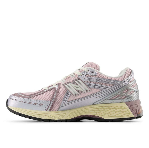 New Balance 1906R sneakers featuring a sleek design with premium mesh and synthetic overlays