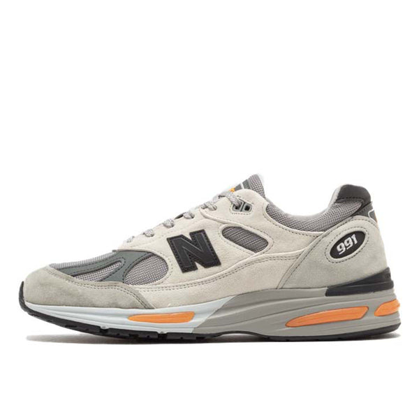 New Balance Made in USA 990v6 sneaker with a streamlined suede and mesh upper, FuelCell cushioning, and a modern grey colorway.