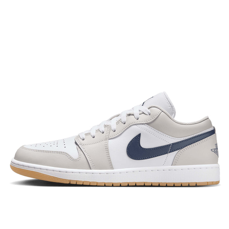 Air Jordan 1 Low sneakers in classic colorway, side profile view.