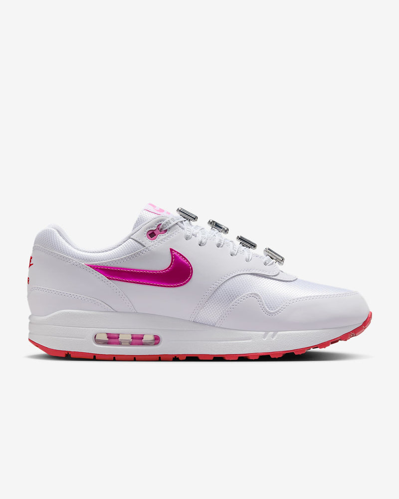 Nike Air Max 1 Premium with mixed materials, glossy Swoosh, and “It’s not me, it’s you” laces