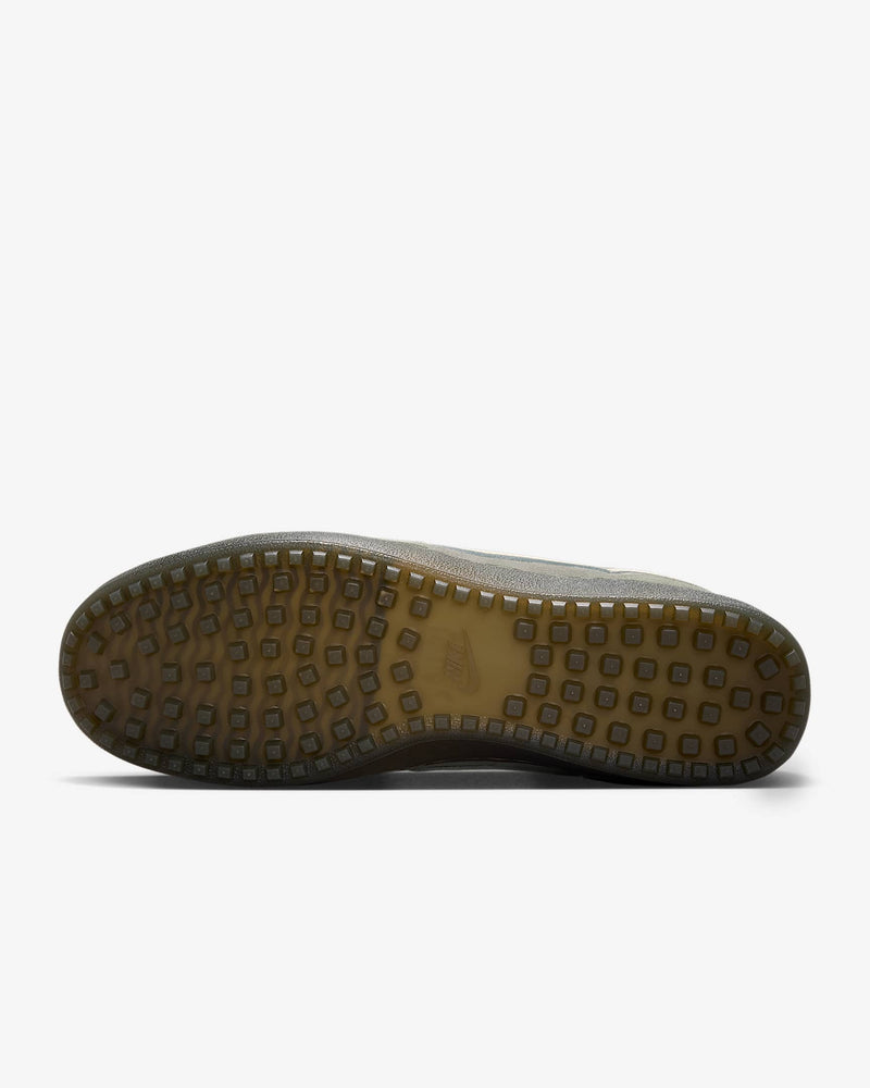 Nike Field General sneaker with textured suede upper, Waffle sole, and metal Swoosh charm for a vintage-meets-modern look