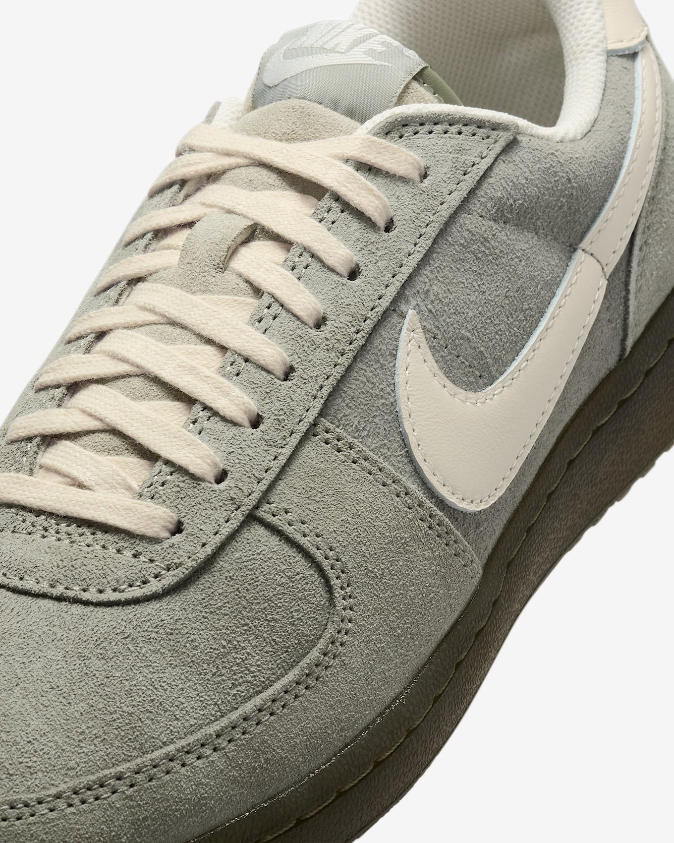 Nike Field General sneaker with textured suede upper, Waffle sole, and metal Swoosh charm for a vintage-meets-modern look