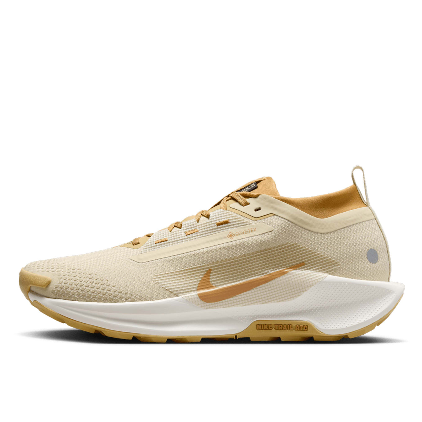 Nike Pegasus Trail 5 trail running shoe with waterproof GORE-TEX upper, ReactX foam cushioning, and rugged all-terrain outsole in Team Gold and Desert Ochre.