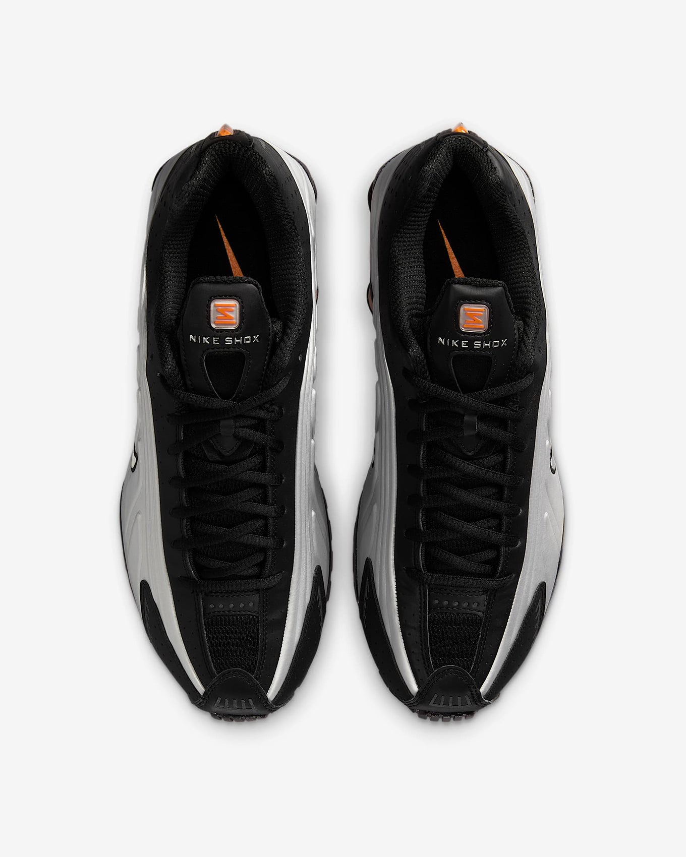 Nike Shox R4 sneaker with metallic finish and signature Shox heel columns for cushioning and futuristic style