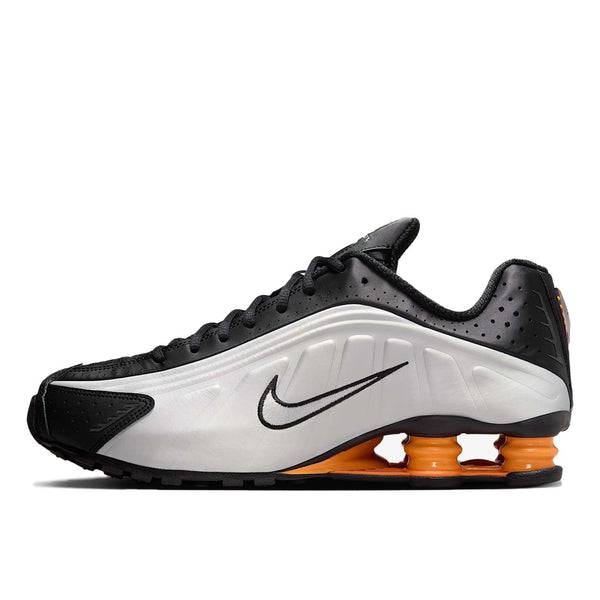 Nike Shox R4 sneaker with metallic finish and signature Shox heel columns for cushioning and futuristic style