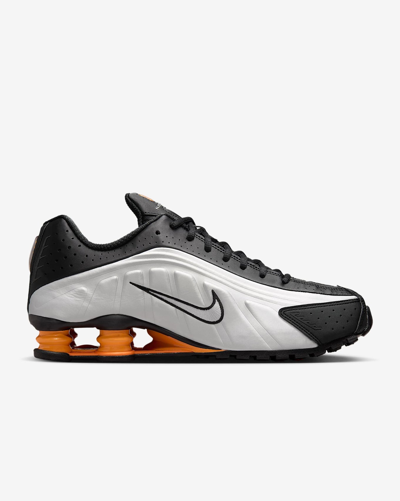 Nike Shox R4 sneaker with metallic finish and signature Shox heel columns for cushioning and futuristic style