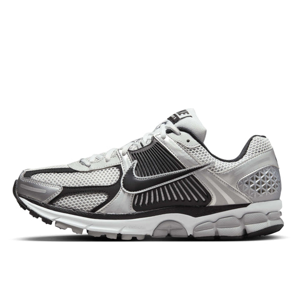Nike Zoom Vomero 5 sneaker with breathable mesh upper, Zoom Air cushioning, and retro runner design.