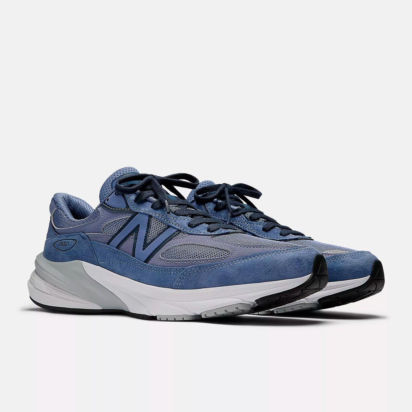 New Balance 990v6 sneaker featuring FuelCell cushioning, sleek design, and MADE in USA craftsmanship, part of the brand’s iconic “Runners Aren’t Normal” campaign.