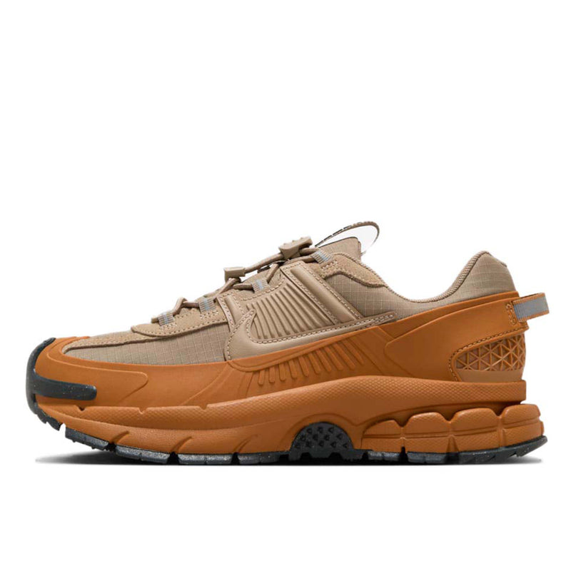 Nike Zoom Vomero 5 Roam sneaker with water-resistant upper, designed for urban and outdoor adventures, offering comfort and durability.