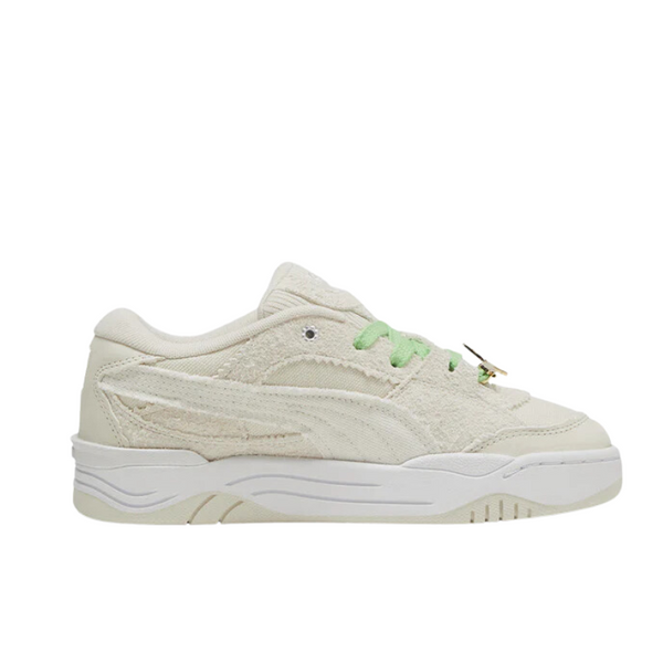 PUMA-180 sneakers inspired by 90s-00s skate culture, featuring oversized padding, chunky shapes, textile base with suede overlays, and a distressed outsole.