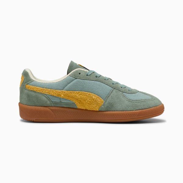 PUMA terrace sneakers with textile base, leather details, and debossed branding, combining retro charm and modern style.