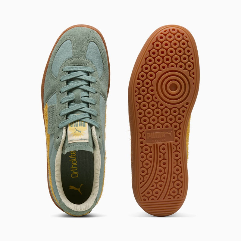 PUMA terrace sneakers with textile base, leather details, and debossed branding, combining retro charm and modern style.