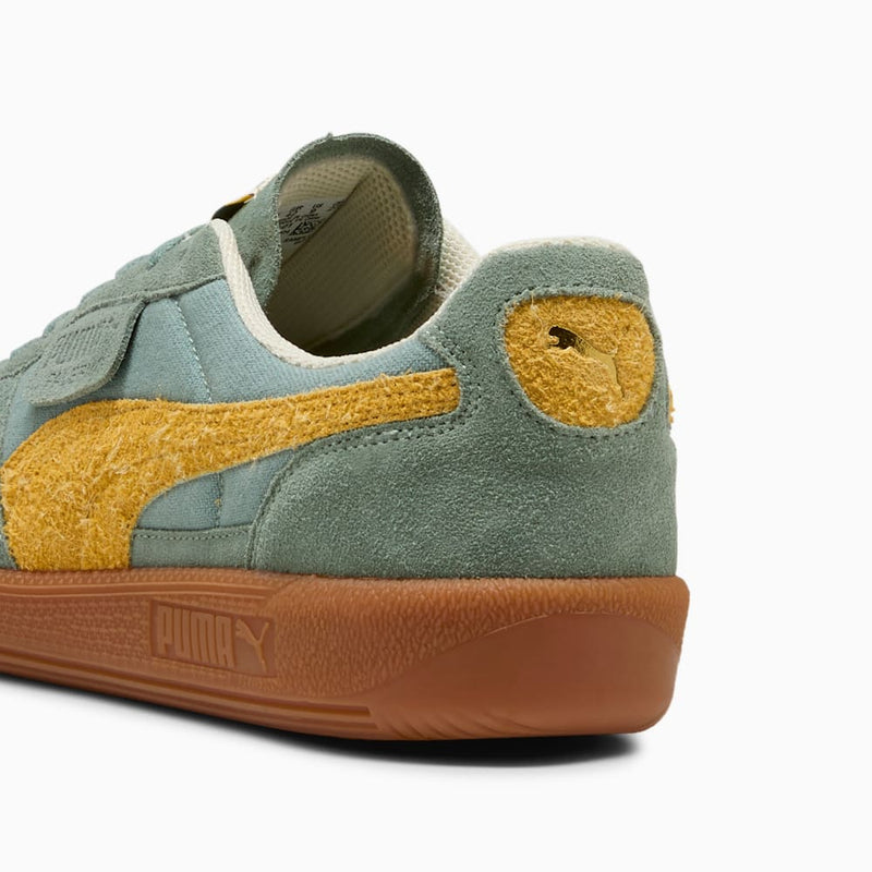 PUMA terrace sneakers with textile base, leather details, and debossed branding, combining retro charm and modern style.