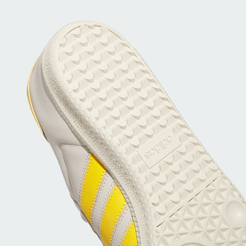 Pharrell x adidas Originals Samba Premium Edition showing ECCO leather upper, zigzag stitching, signature 3-Stripes, suede T-toe, and floating heel tab.



