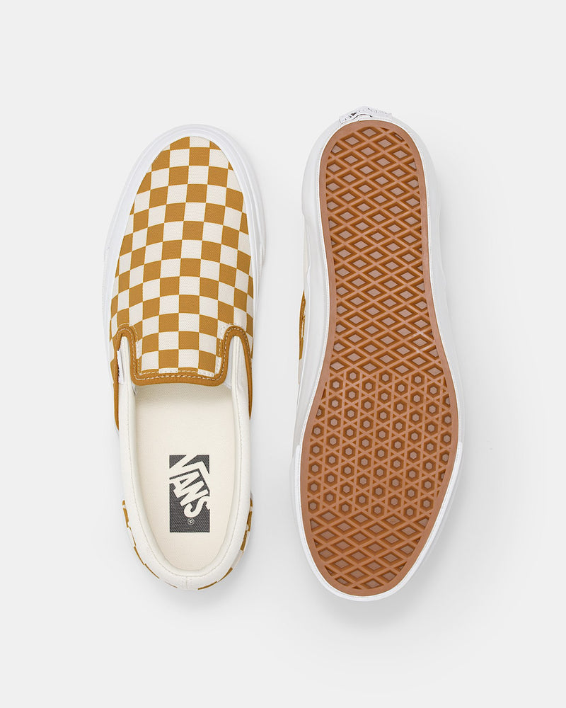 Premium Slip-On 98 Shoes featuring a checkerboard print, full-grain leather collar lining, gloss-finished sidewalls, and Sola Foam All-Day-Comfort.