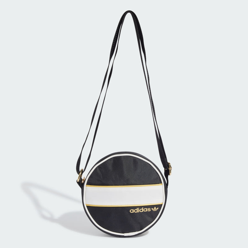 adidas round bag with circular design, metallic gold accents, contrast piping, and adjustable strap for shoulder or crossbody carry.


