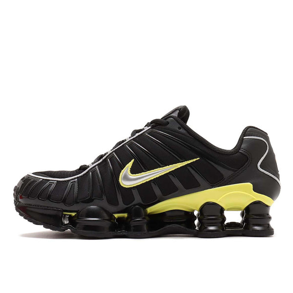 Nike Shox TL sneaker with breathable nylon mesh upper, plastic overlays, full-length Shox cushioning, and TPU plate for stability and support.