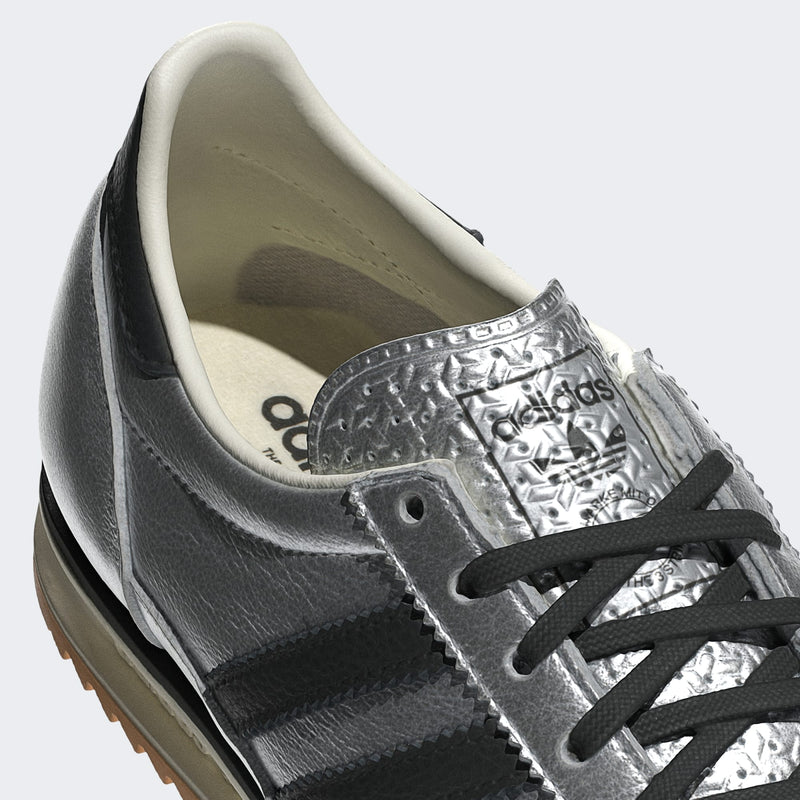 adidas SL 72 shoes with a metallic leather upper, showcasing their slender silhouette and low-profile cut, featuring an EVA midsole for comfort.