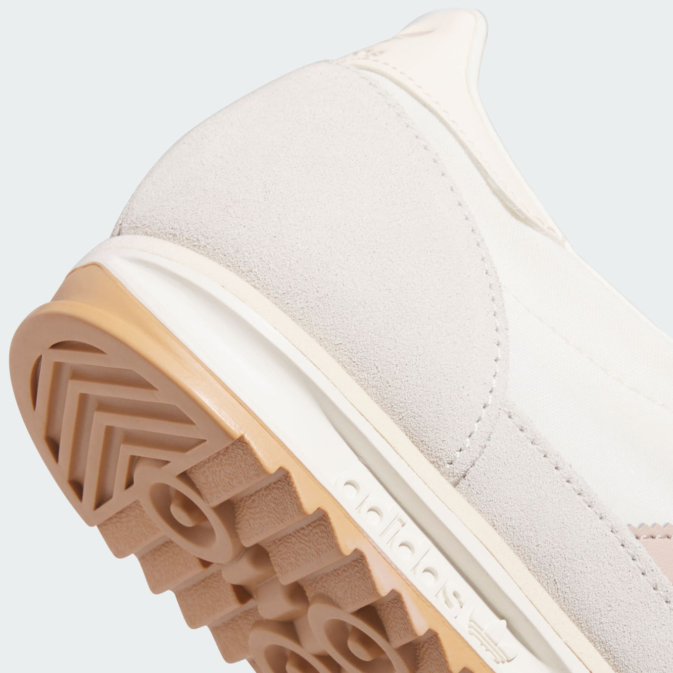 adidas SL 72 OG sneaker with a nylon upper, suede overlays, EVA midsole, and rubber outsole for a retro-inspired look and cushioned comfort.