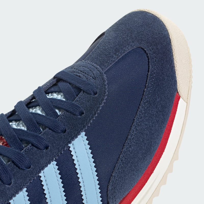 adidas SL 72 shoes with a sleek 1972 design, featuring an EVA midsole, textured rubber outsole, and suede overlays on a nylon upper.



