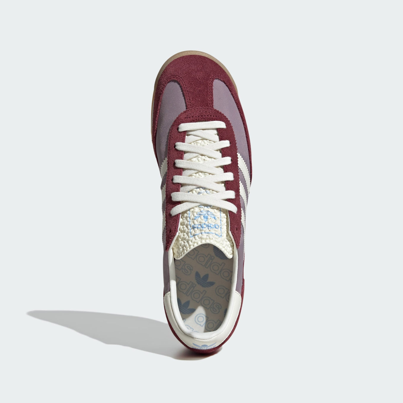 adidas SL 72 shoes with a nylon upper and suede overlays, showcasing their retro design, EVA midsole, and grippy outsole.


