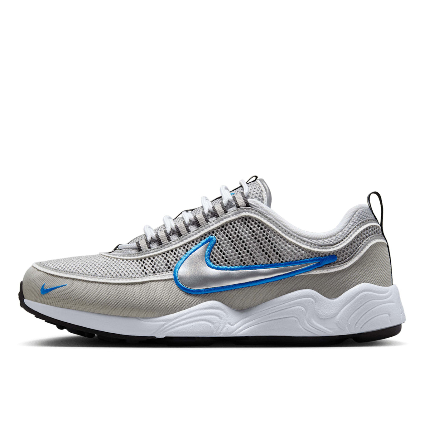 Air Zoom Spiridon retro sneaker with reflective design piping, airy mesh upper, full-length Air Zoom cushioning, and Metallic Silver and Signal Blue colorway.