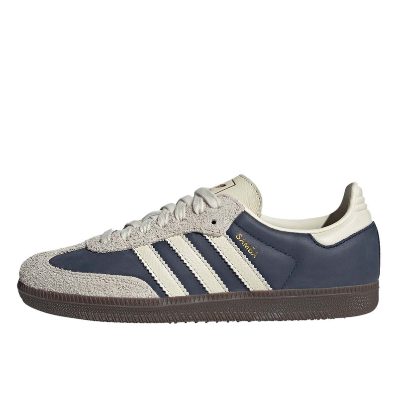 adidas Samba sneakers with premium leather upper, hairy suede accents, and dark gum outsole, showcasing their classic design and gold-printed logo.