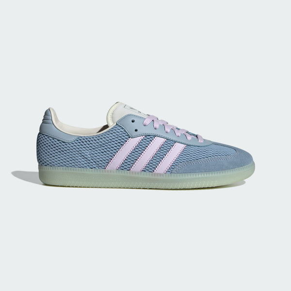 adidas Samba OG sneaker with a mesh-textured leather upper, classic T-toe overlay, and stitched heel tab, embodying vintage style with modern comfort.