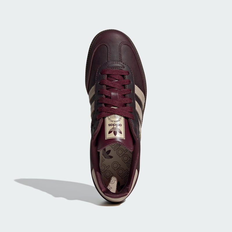 adidas Samba OG shoes in premium leather with shiny accents, showcasing their iconic silhouette and versatile style.


