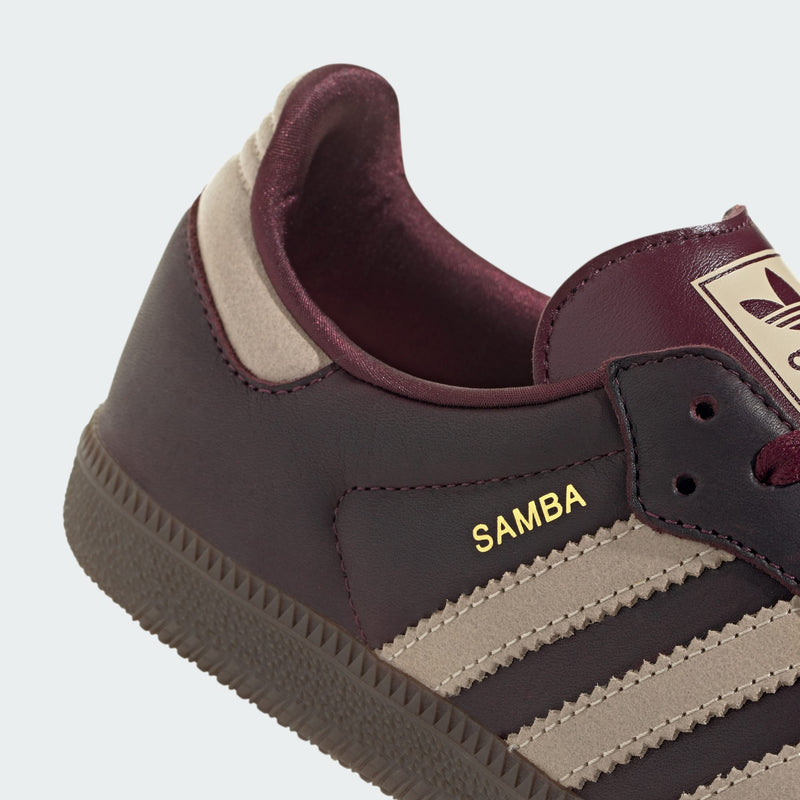 adidas Samba OG shoes in premium leather with shiny accents, showcasing their iconic silhouette and versatile style.


