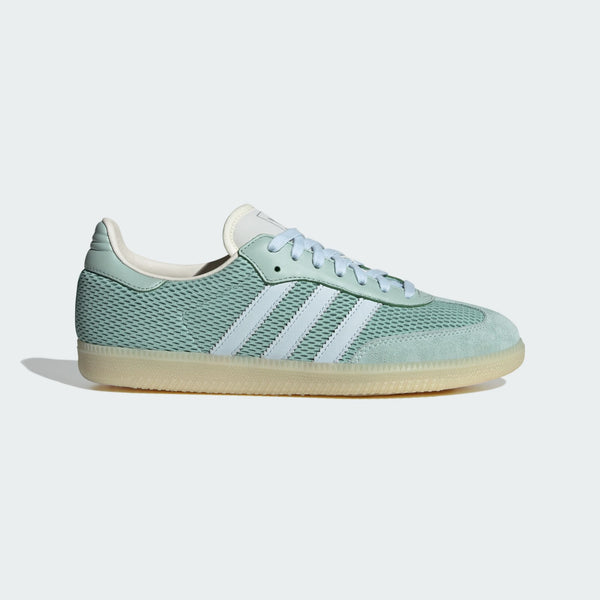 adidas Samba OG sneaker with a mesh-textured leather upper, classic T-toe overlay, and stitched heel tab, embodying vintage style with modern comfort.