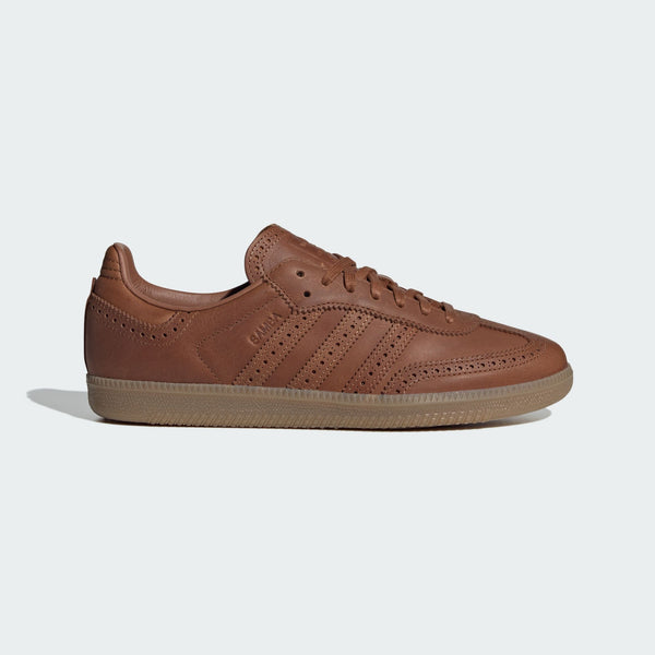 adidas Samba OG Shoes with a premium leather upper, brogue detailing, rubber outsole, and signature 3-Stripes, blending classic sports heritage with sophisticated street style.