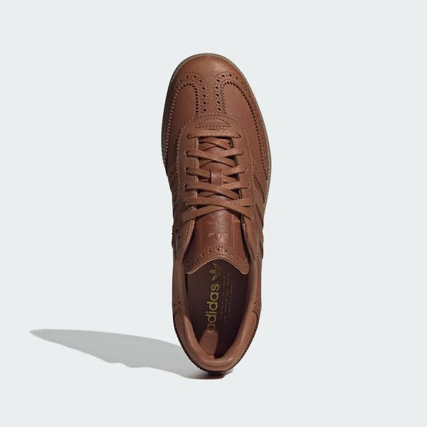 adidas Samba OG Shoes with a premium leather upper, brogue detailing, rubber outsole, and signature 3-Stripes, blending classic sports heritage with sophisticated street style.