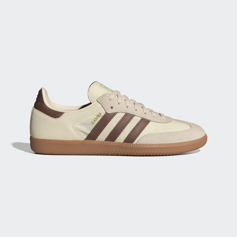 Adidas Samba OG shoes featuring a leather and suede upper, textile lining, and rubber outsole, blending classic design with modern comfort.


