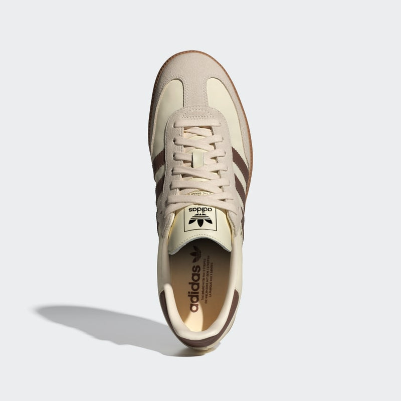 Adidas Samba OG shoes featuring a leather and suede upper, textile lining, and rubber outsole, blending classic design with modern comfort.


