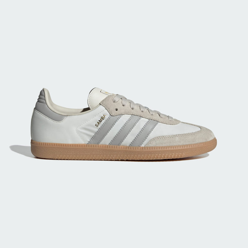 adidas Samba OG shoes showcasing iconic indoor football trainer style with leather and suede upper, textile lining, and rubber outsole for comfort and durability.


