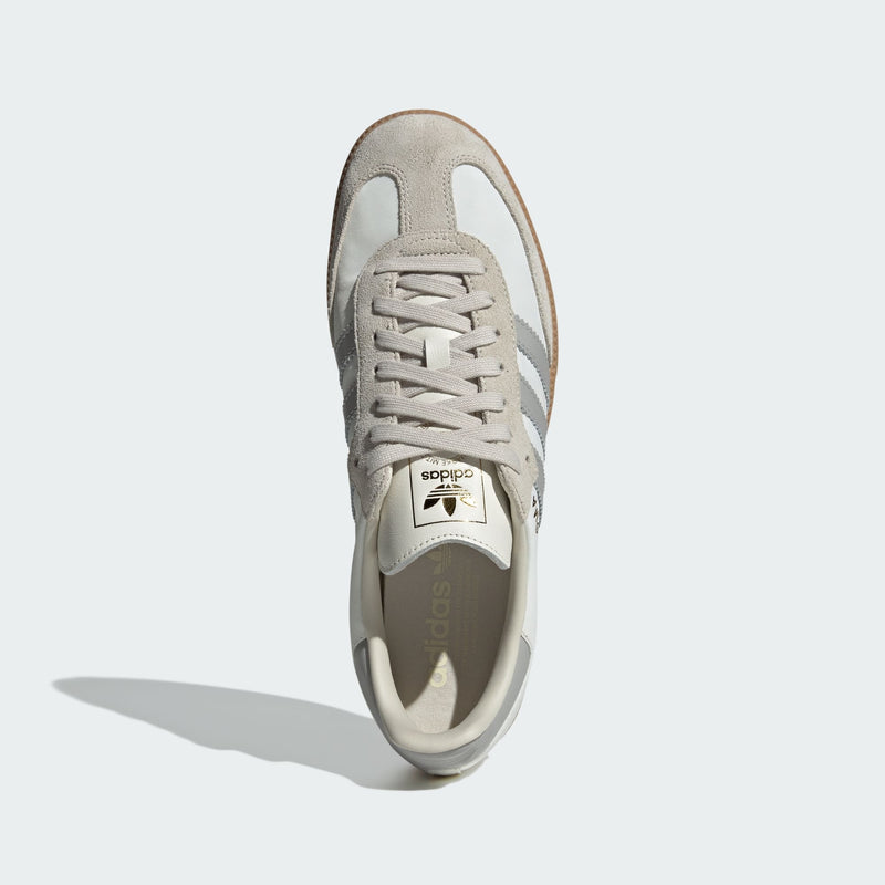 adidas Samba OG shoes showcasing iconic indoor football trainer style with leather and suede upper, textile lining, and rubber outsole for comfort and durability.


