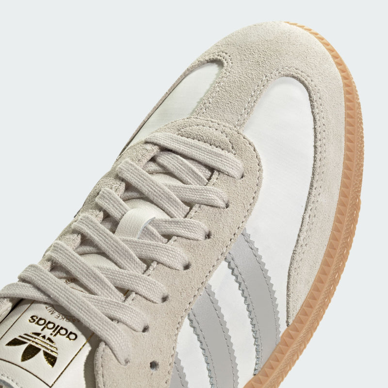 adidas Samba OG shoes showcasing iconic indoor football trainer style with leather and suede upper, textile lining, and rubber outsole for comfort and durability.


