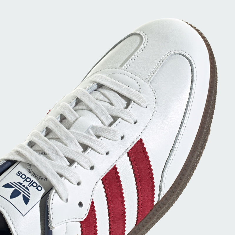 Adidas Samba OG shoes with a leather upper, serrated 3-Stripes, reinforced toe, and suede accents, celebrating over 70 years of timeless style.