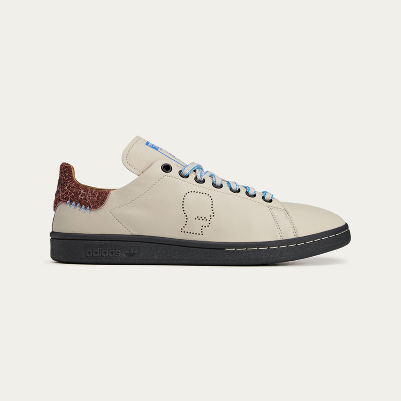 adidas Stan Smith x Brain Dead sneakers featuring bold colors, unique detailing, and lace chain collaboration highlight.