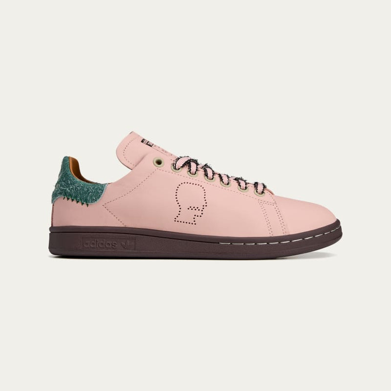 adidas Stan Smith x Brain Dead sneakers with bold color accents, custom laces, and a signature lace chain detail.