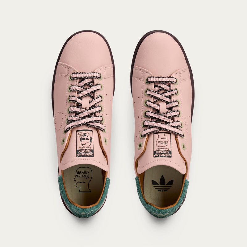 adidas Stan Smith x Brain Dead sneakers with bold color accents, custom laces, and a signature lace chain detail.