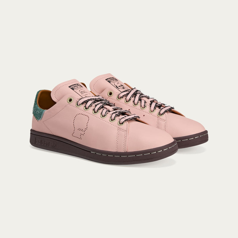 adidas Stan Smith x Brain Dead sneakers with bold color accents, custom laces, and a signature lace chain detail.